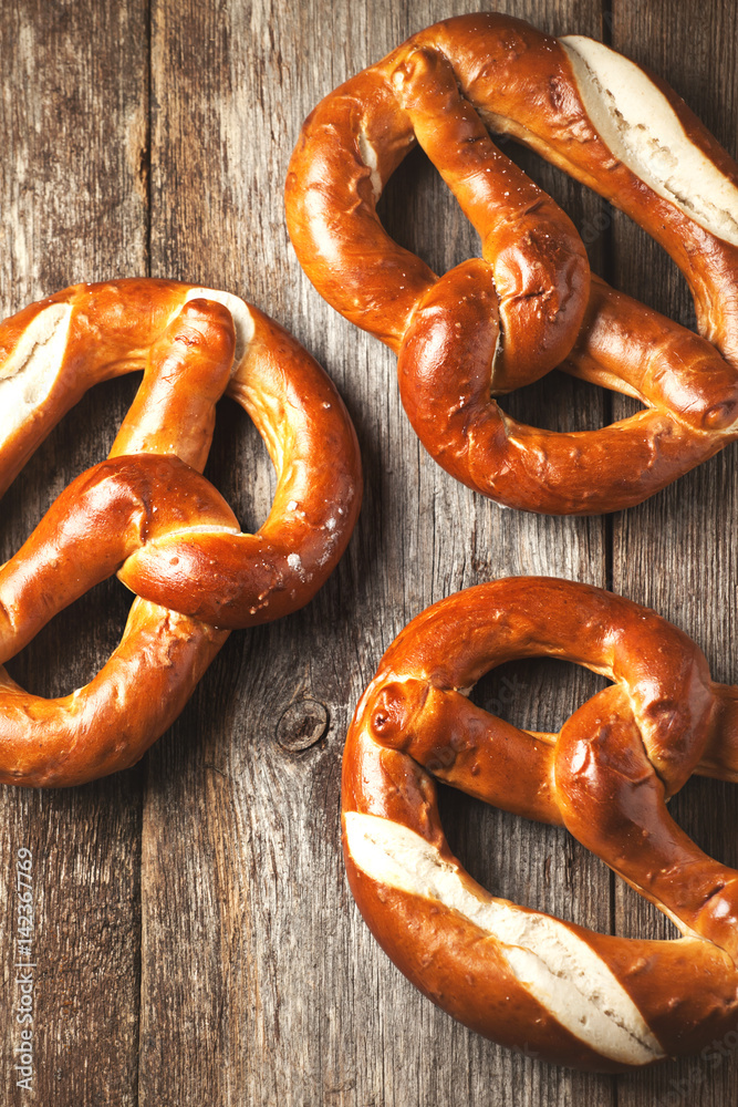 Wall mural Pretzels on wooden background