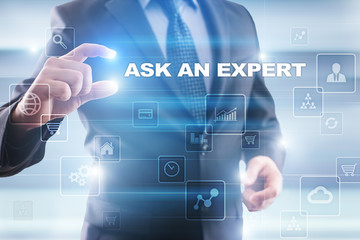 Businessman selecting ask an expert on virtual screen.