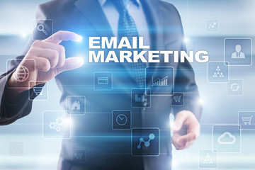 Businessman selecting email marketing on virtual screen.
