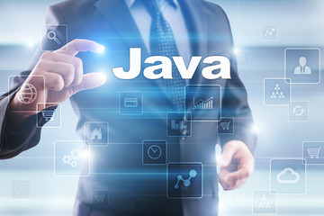 Fototapeta premium Businessman selecting java on virtual screen.