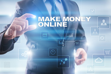 Businessman selecting make money online on virtual screen.
