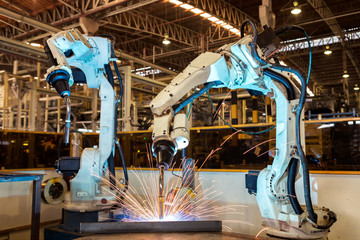 Industrial robots are welding part