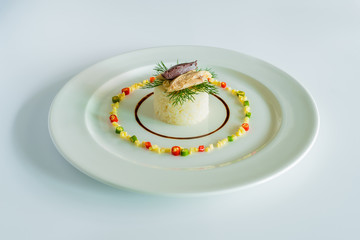 Thai chicken rice with food plating ideas on the white table.