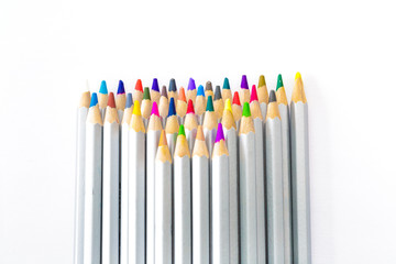 Naklejka premium set of different colored pencils on white background