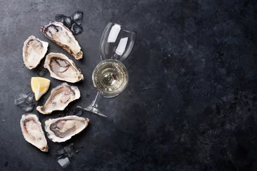 Rolgordijnen Oysters with lemon and white wine © karandaev