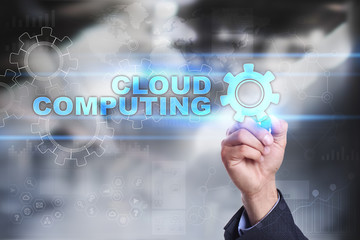 Businessman is drawing on virtual screen. cloud computing concept.