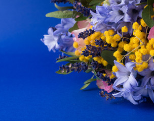 Spring bouquet on a blue background.
