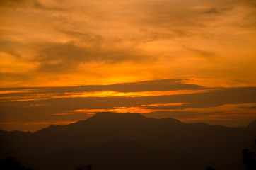 Fototapeta na wymiar Sunset on mountain background