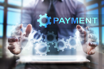 Businessman using tablet pc and selecting payment.