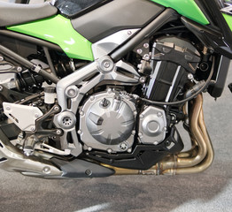 Fototapeta na wymiar Motorbike Engine - Modern powerful performance road motorbike engine(motor unit - clean and shiny