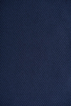 Dark blue wrinkled fabric.