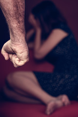 Domestic or gender violence - Aggressive man threatens to hit a young woman