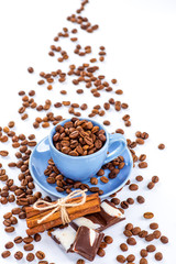 Coffee cup and beans on a white background.