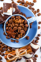 Coffee cup and beans on a white background.
