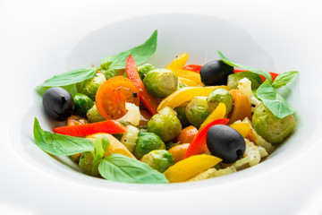 Salad of fried Brussels sprouts, paprika and olives
