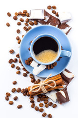 Coffee cup and beans on a white background.