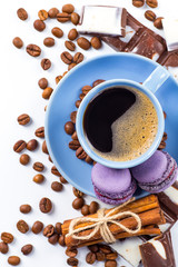 Coffee cup and beans on a white background.
