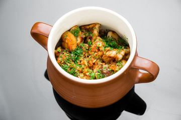 Buckwheat with mushrooms in a pot