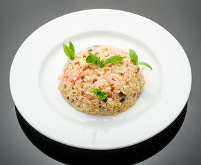 Fried rice with shrimps on wood