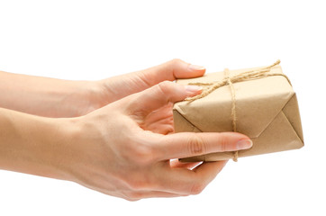 Obraz premium female hand holding gift box.