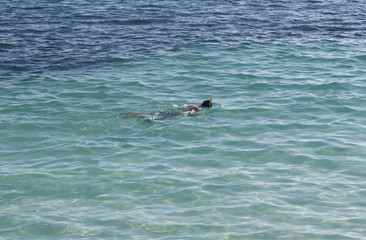 Snorkeling in the turquoise waters.