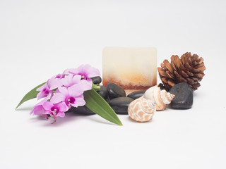 Aromatherapy  product  Spa set ,candle ,soap,coconut orchid flower,shell,  massage  with white wood  background . top view composition.