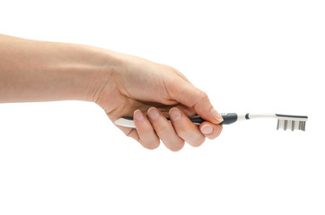 woman hand holding toothbrush.
