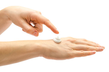 woman hand holding cream.