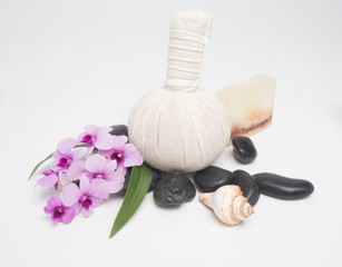 Fototapeta na wymiar Aromatherapy product Spa set ,candle ,soap,coconut orchid flower,shell, massage with white wood background . top view composition.