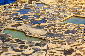 Saltworks carved into the rock