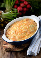 Potato casserole with chicken breast, mushrooms, onion and cheese.