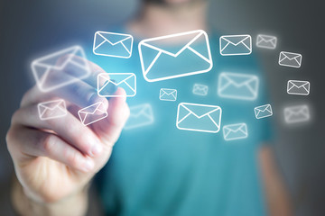 Concept of man drawing email icon on technology interface
