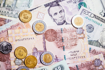 Egyptian pound with dollars banknote.