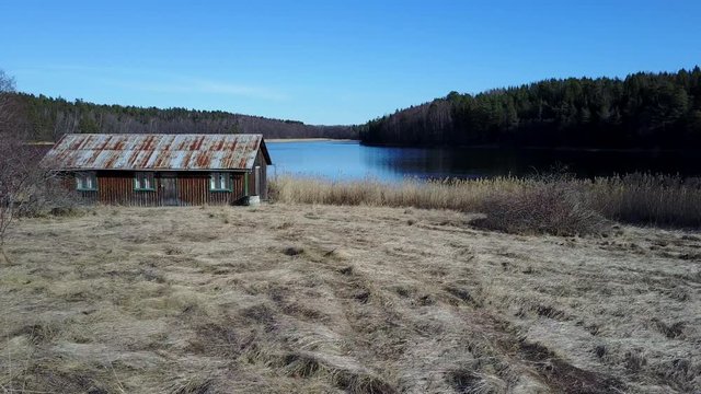 Lake House in Spring - Aerial Flight