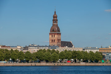 Fototapeta premium Old town summer day view with Daugava river and Dome church