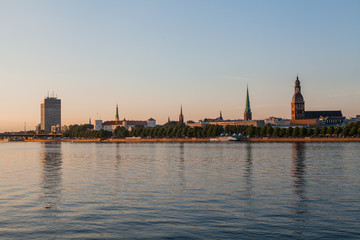 Obraz na płótnie Canvas Old town of Riga summer sunset skyline with Daugava river