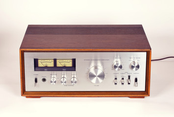 Fototapeta premium Vintage Stereo Audio Amplifier in Wooden cabinet