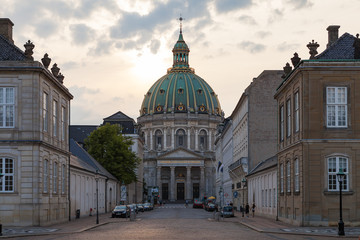 Fototapeta na wymiar COPENHAGEN, DENMARK - 24 JUN 2016: Street view of Frederik's Church, popularly known as The Marble Church for its rococo architecture, is an Evangelical Lutheran church