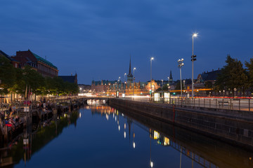 Night view on Christiansborg Palace over the channel in Copenhagen.