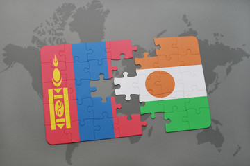 puzzle with the national flag of mongolia and niger on a world map