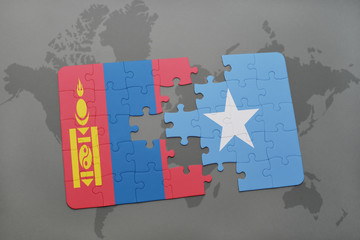 puzzle with the national flag of mongolia and somalia on a world map