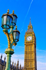 Fototapeta na wymiar View of the Houses of Parliament with the street lamp on the Westminster Bridge in London