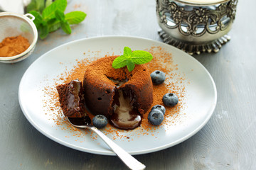 Fondant- delicious chocolate dessert with blueberries.