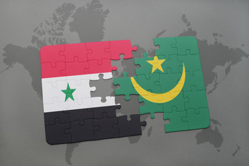 puzzle with the national flag of syria and mauritania on a world map