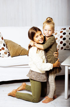 little cute brunette girl at home interior happy smiling close up, lifestyle real people concept