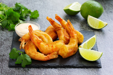 Shrimp fried in batter with sauce.