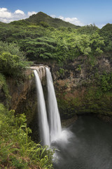 Wailua falls near the island capital Lihue on the island of Kauai, Hawaii.
Wailua Falls is most recognized in the opening credits of the long-running television show "Fantasy Island."