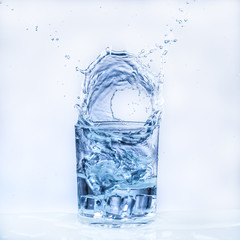 ice cube into a glass of water