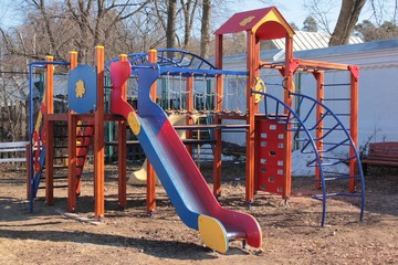 A slide for the kids at the Playground on a Sunny spring day