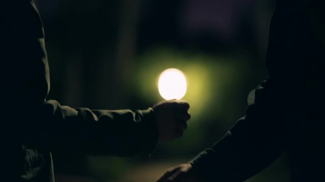 Hand to hand drug transacation at night,suspicious activity 50p